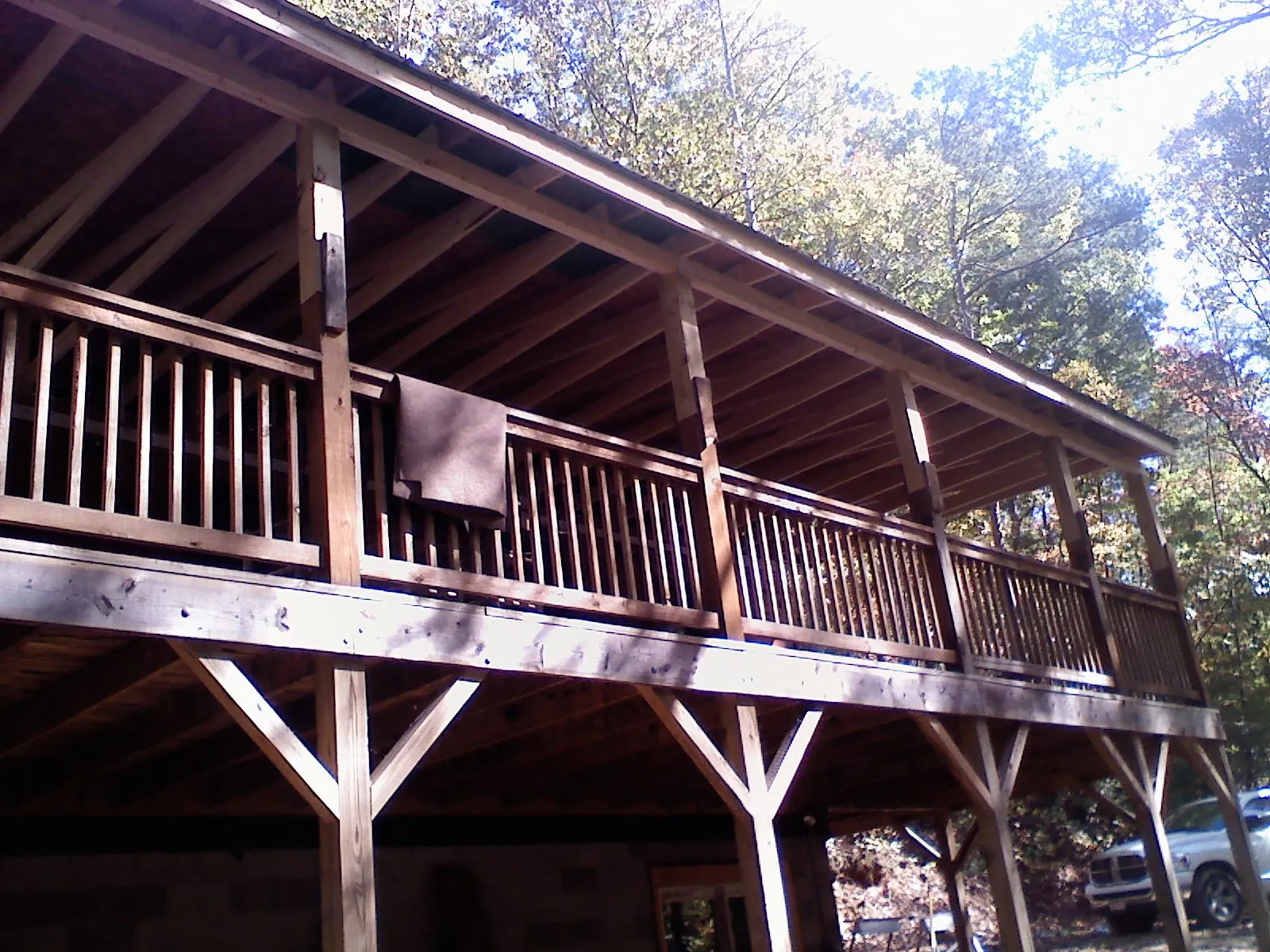 Timber framing under a new elevated porch and deck — Roof Leak Repair in Cupertino by Roofing Brothers